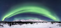 Aurora Arch Over Mountains