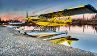 Yellow Super Cub on Floats