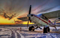 Super Cub on a Snowy Sunset